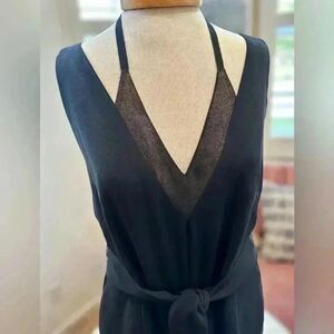 123 Paris bod conscious jumpsuit with bronze inlay. Side pockets, deep V back.